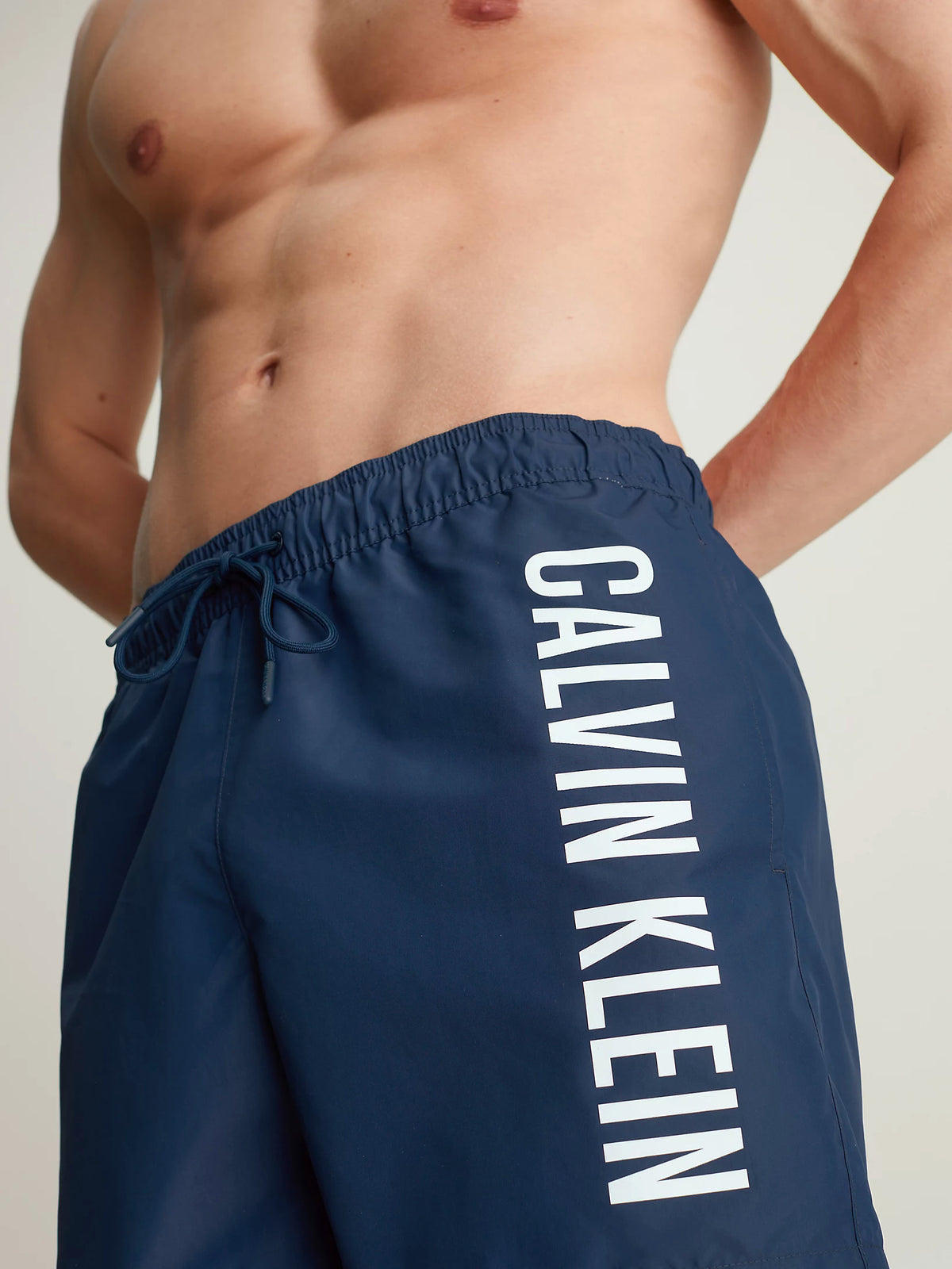 Calvin Klein Mens 'Intense Power' Side Logo Swim Shorts, 02, Km0Km01004, Signature Navy